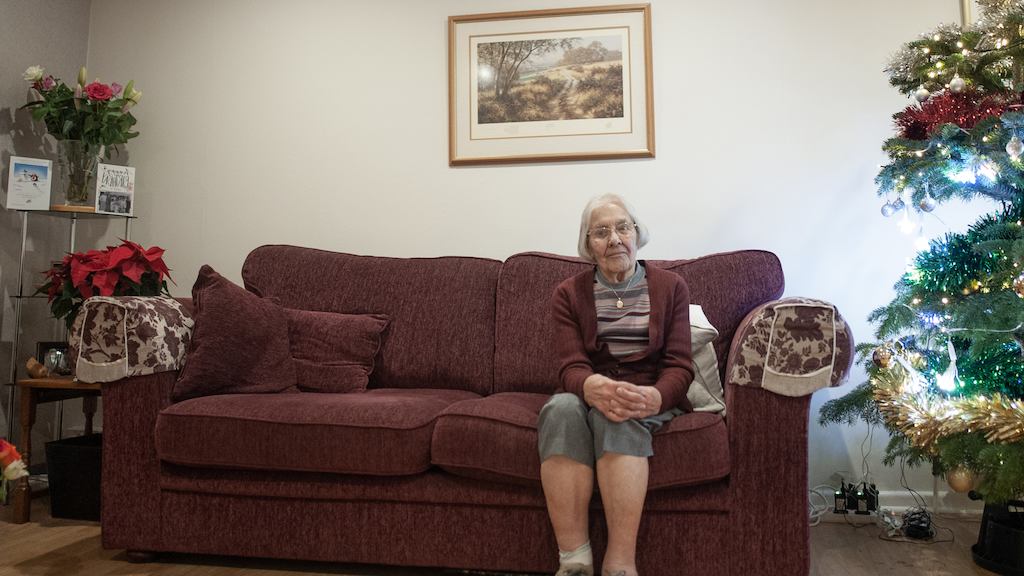 Older-woman-on-sofa