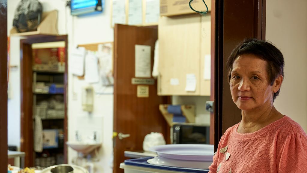 Older-woman-working-in-kitchen
