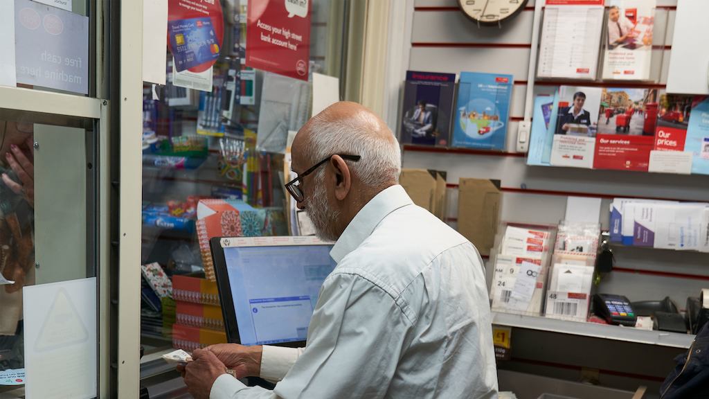 Older-man-working-in-post-office