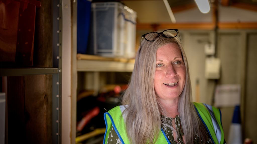 Older-woman-working-in-a-warehouse