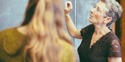 teacher using whiteboard
