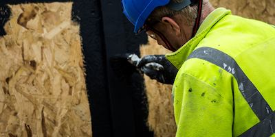 older worker in hard hat
