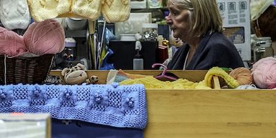 Woman shopping in Eccles, Greater Manchester