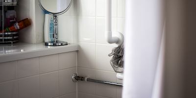 A handrail in a shower