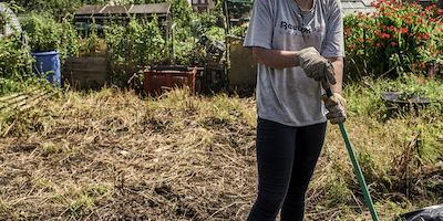 Woman gardening, Gorsehill, Greater Manchester