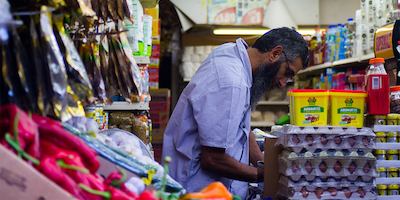 Older worker in a market