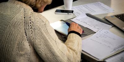 woman-reading-tablet