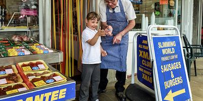 Butcher with young girl