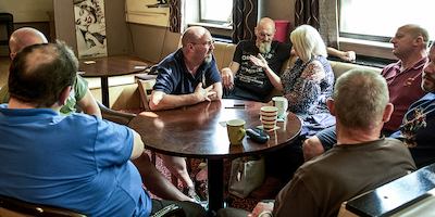 Group of people in later life in a bar
