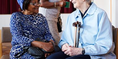 Two older women talking