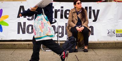 Older woman sitting on a chair