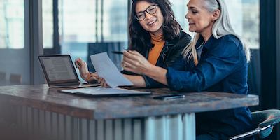 Older worker with younger worker