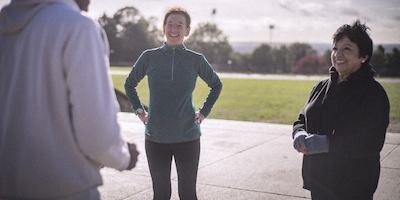 Group of older adults exercising outside