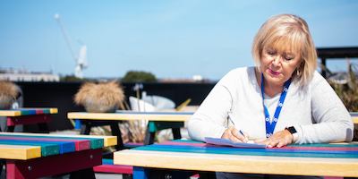 older worker writing