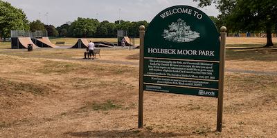 A sign in a park, saying Holbeck