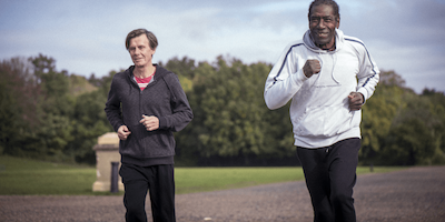 Two older men exercising outdoors