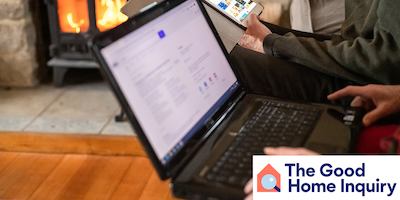 Older couple interacting with tablet and laptop