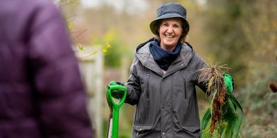 older woman gardening