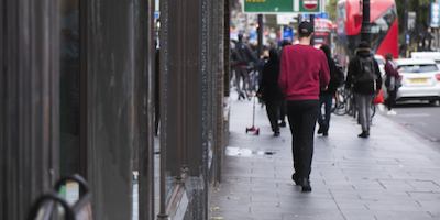 people walking down a street