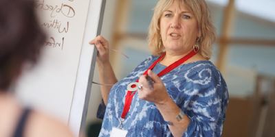 older woman teaching