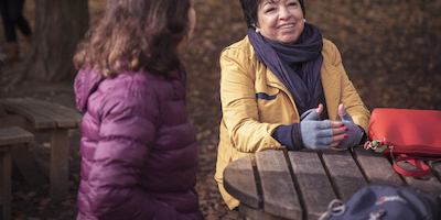 older women sitting talking together
