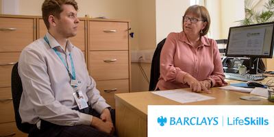 Two workers in an office