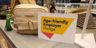 Photo of the employer pledge sign in an Oliver Bonas shop