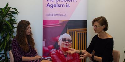 Ashton and Jo sitting down and talking