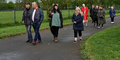 People walking along a road