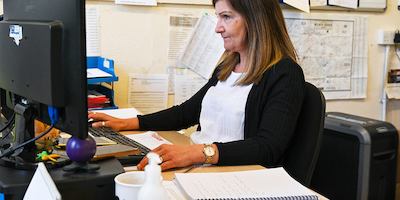 Older woman working on computer