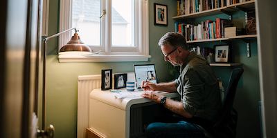Older man working in a home office