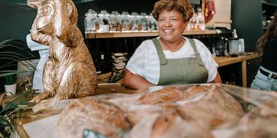Older woman working in a cafe
