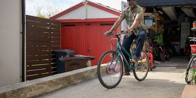 Older man on bike