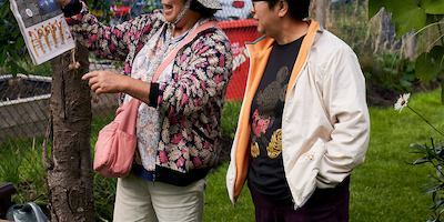 Two older women socialising outside