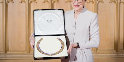 Dame Carol receiving the Dame Grand Cross of the Order of the British Empire
