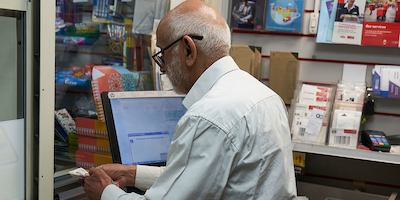 Older-man-working-in-post-office