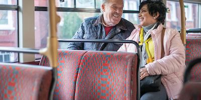 Two-older-people-on-a-bus
