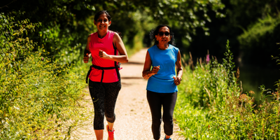Two women jogging together