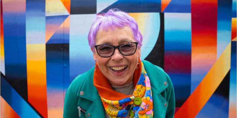 Older woman with purple hair
