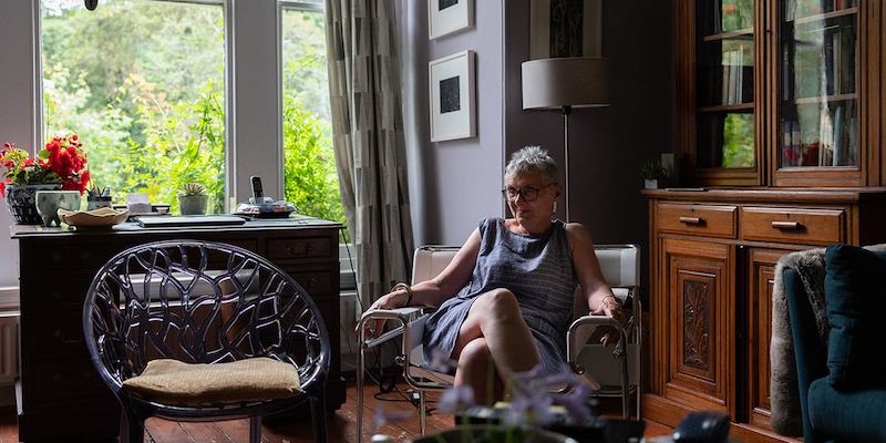 Older-woman-sat-at-home