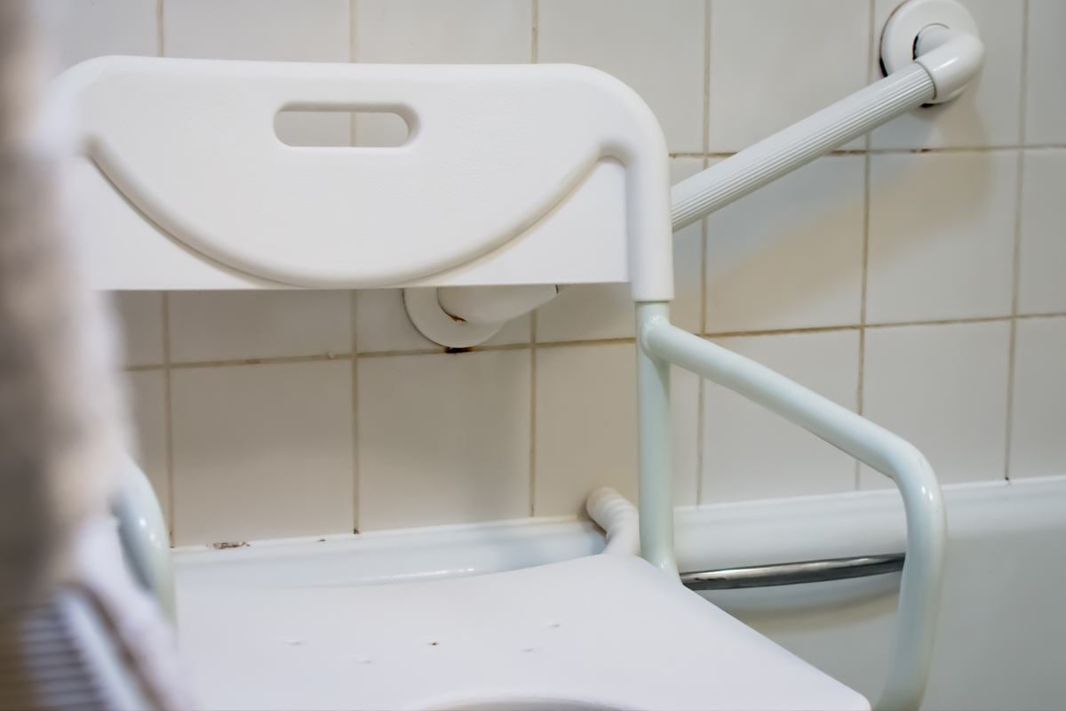 Bathroom adaptations: seat and grabrail