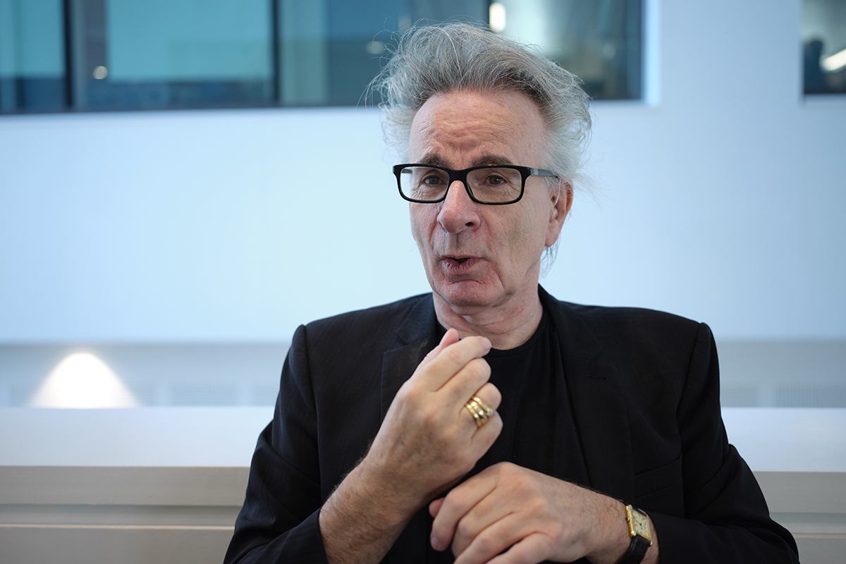 Howard, looking into camera