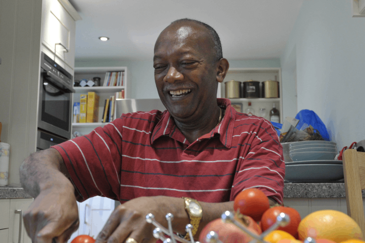 Tony chopping vegetables