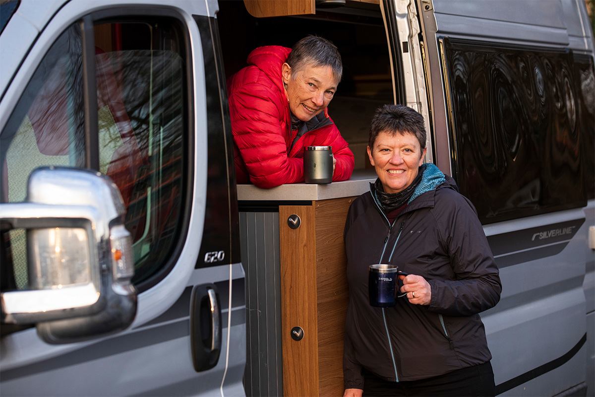 Jo and Liz outside their campervan