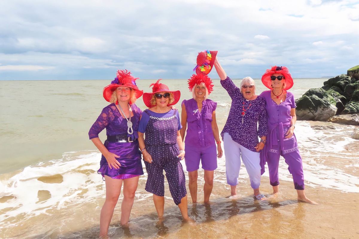 The winning photo of North Norfolk’s Age Positive Photography Competition. ’Red Hat Ladies’ by Sally Redgrave.  