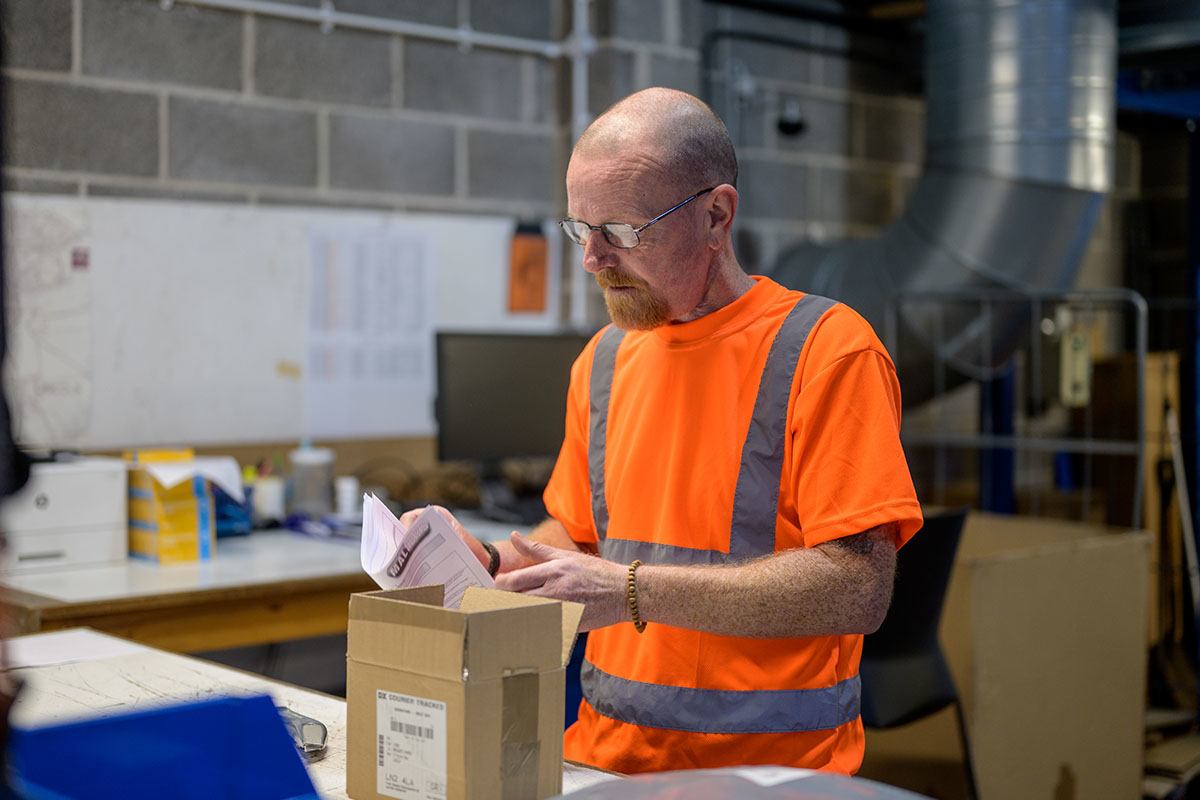 Older-man-working-in-a-warehouse