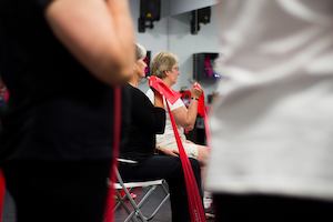 Strength and balance class with resistance band