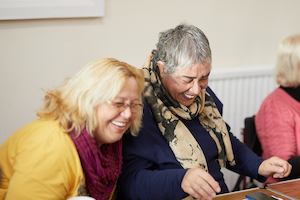 Woman hugging her friend