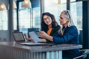 Older worker with younger worker