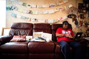 man on laptop at home